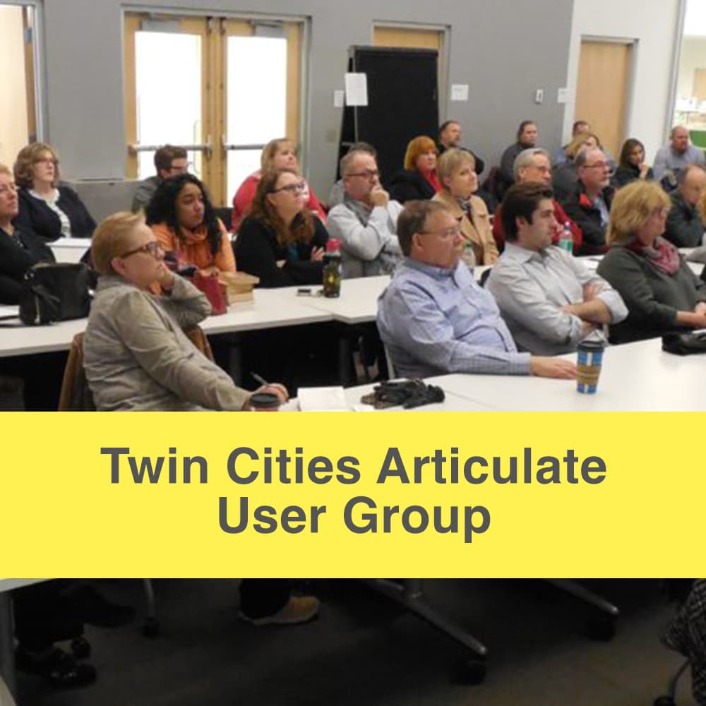 Twin Cities Articulate User Group caption, community members seated at tables listening to a speaker